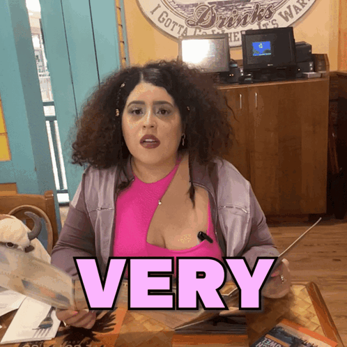 Woman at Table with Word Very