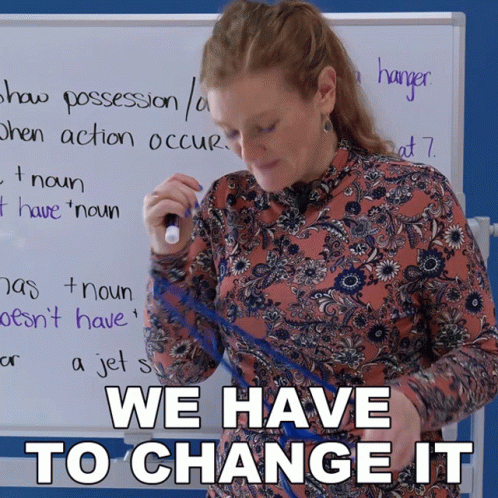 Woman at Whiteboard: We Have to Change It