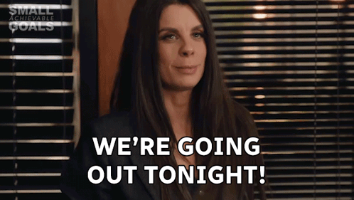 Woman at Window Saying We're Going Out Tonight