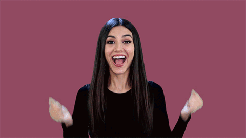 Woman Black Shirt Arms Up Smiling