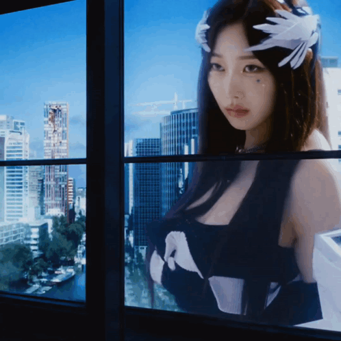 Woman Black Top Letter A Looking Out Window