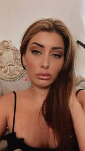 Woman Black Top Selfie Hand in Hair