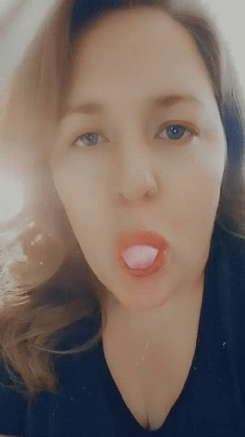 Woman Blow Bubble Gum In Her Mouth GIF