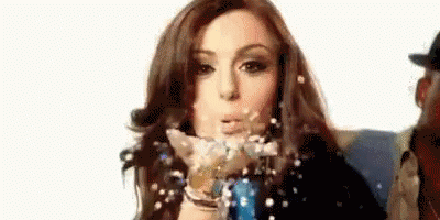 Woman Blowing Confetti