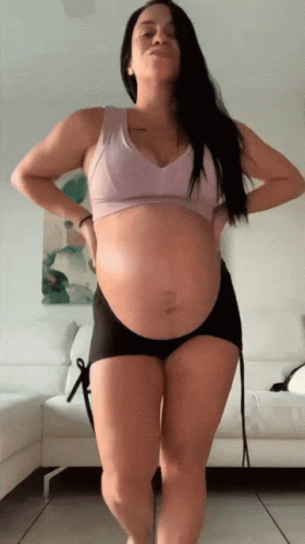 Woman Blowing Kiss Pregnant Belly GIF