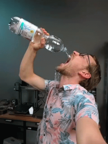 Woman Blue Ban Am Wak Drinking Purple Bottle
