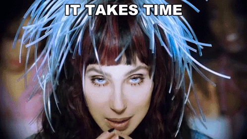 Woman Blue Feathered Hat It Takes Time