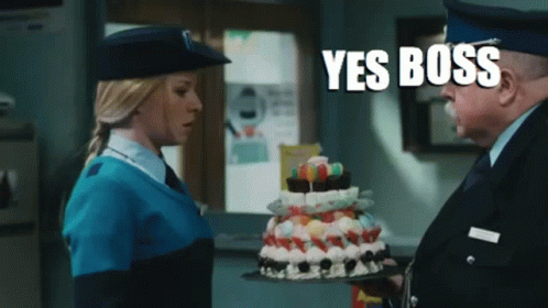 Woman Blue Uniform Cake Man Blue Hat Says Yes Boss