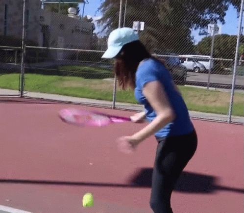 Woman Bouncing Tennis Ball GIF