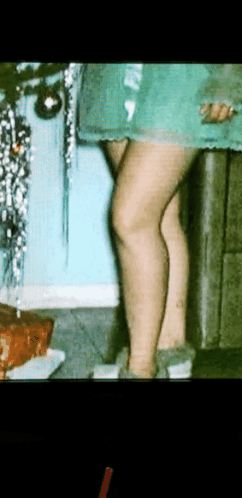 Woman by Christmas Tree