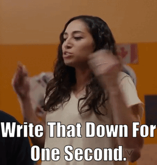 Woman By Sign Saying Write That Down For One Second GIF