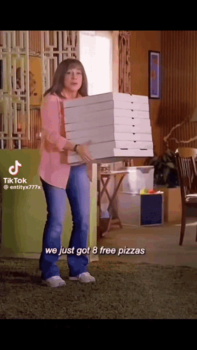 Woman Carrying Stack Of Pizza Boxes GIF