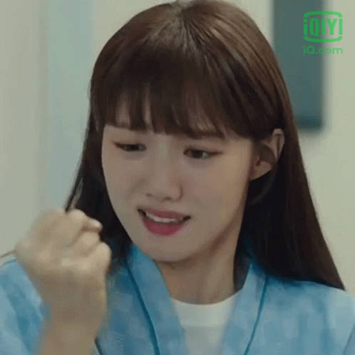 Woman Close Up With IOI Logo GIF