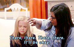 Woman Comforting Girl Saying There There It'll Be Okay