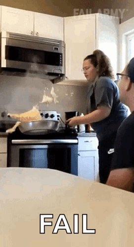 Woman Cooking in Kitchen With Fail