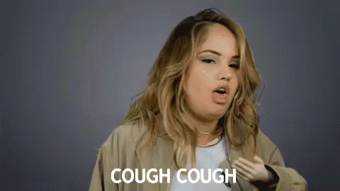 Woman Coughing With Hand On Chest Saying Cough Cough GIF