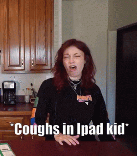 Woman Coughs In Kitchen Saying Coughs In Ipad Kid GIF
