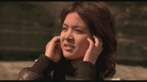 Woman Covering Ears GIF
