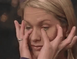 Woman Covering Eyes With Hands GIF