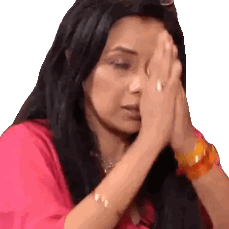 Woman Covering Face in Pink Shirt