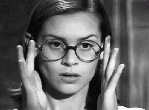 Woman Covering Face with Glasses