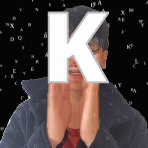 Woman Covering Face With Letter K GIF