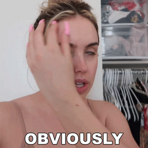 Woman Covering Face With Pink Nails