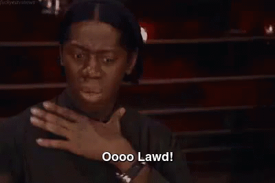 Woman Covering Mouth Saying Oooo Lawd