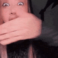 Woman Covering Mouth Surprised