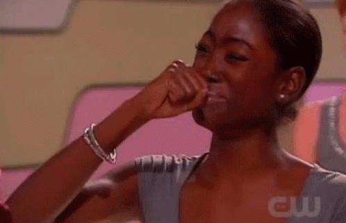 Woman Covering Mouth While Crying