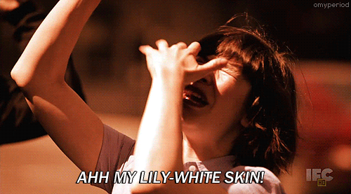 Woman Covering Nose Saying Ahh My Lily White Skin