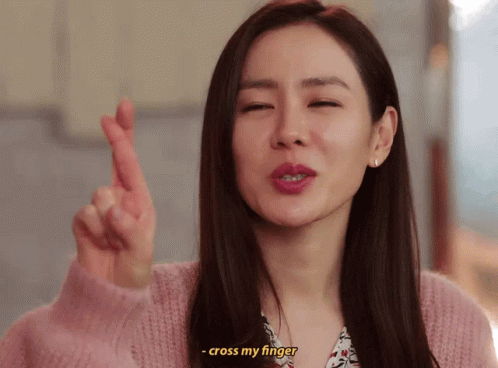 Woman Crossing Fingers Saying Cross My Finger GIF
