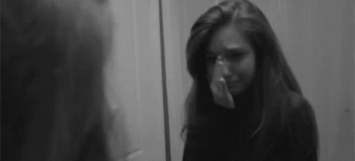 Woman Crying Covering Face