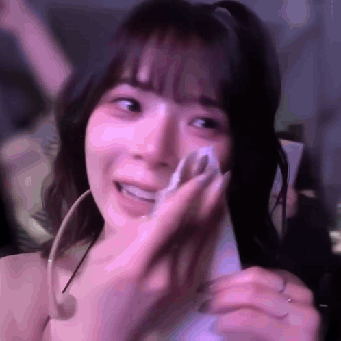 Woman Crying Holding Napkin