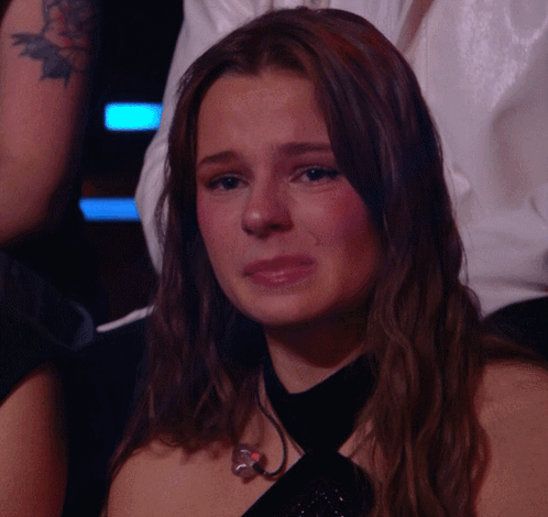 Woman Crying in Black Top