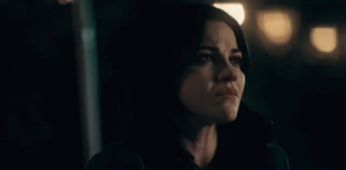 Woman Crying in Dark Room