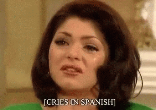 Woman Crying in Spanish in Green Shirt and Green Sweater