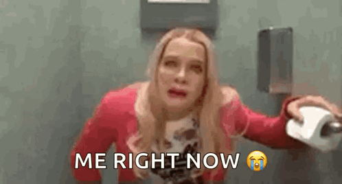 Woman Crying in Toilet Holding Toilet Paper