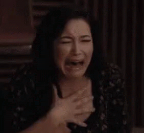 Woman Crying With Hands on Chest Making Funny Face