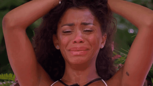 Woman Crying With I Love You Tattoo