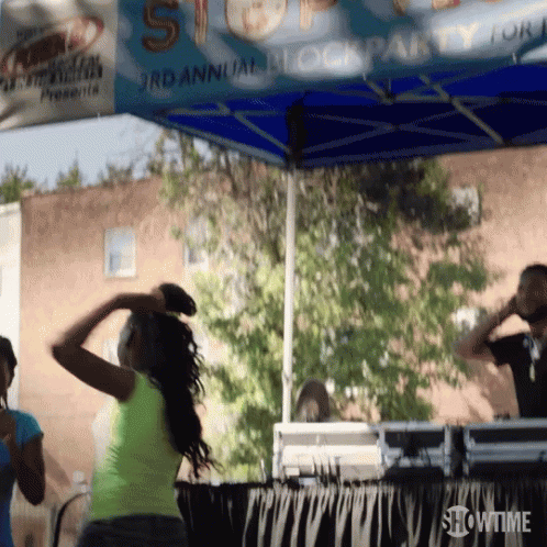 Woman Dancing At Showtime Tent GIF