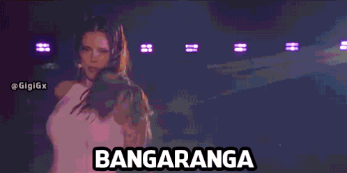 Woman Dancing Before Crowd With Bangaranga