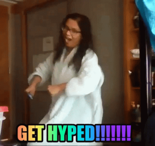Woman Dancing In Front Of Get Hyped Sign GIF