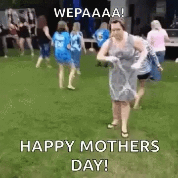 Woman Dancing In Grass With Group GIF