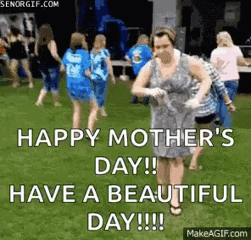 Woman Dancing In Grass With Group GIF