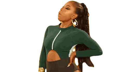 Woman Dancing in Green Top and Black Shorts