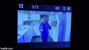 Woman Dancing in Kitchen with 3/3 on Screen
