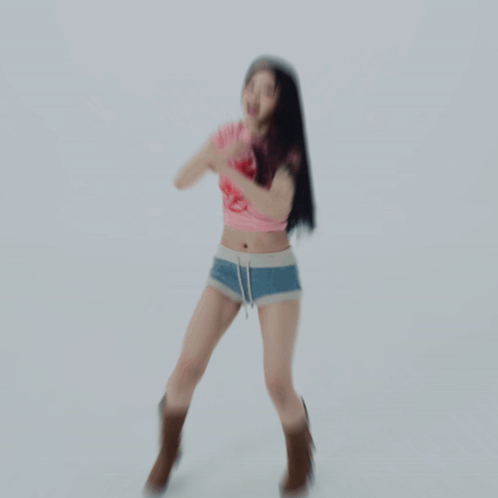 Woman Dancing in Pink Top and Shorts