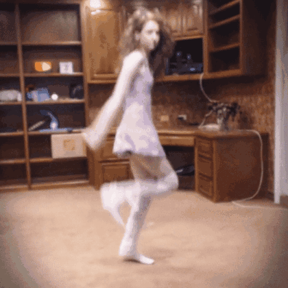 Woman Dancing in White Dress and Knee-High Socks