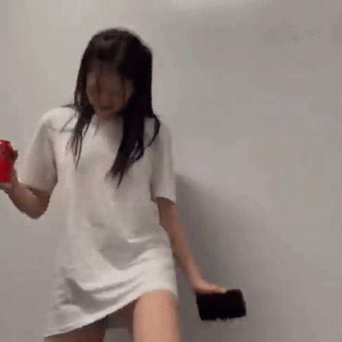 Woman Dancing In White T-Shirt And Shorts GIF